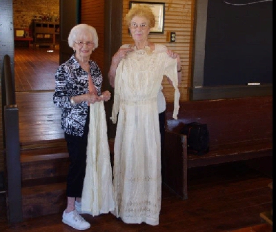 Ann with Mrs. Weivil accepting a donation